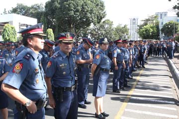 国家警察本部で勤務する警官(記事の内容とは一切関係ありません)=首都圏ケソン市で27日写す